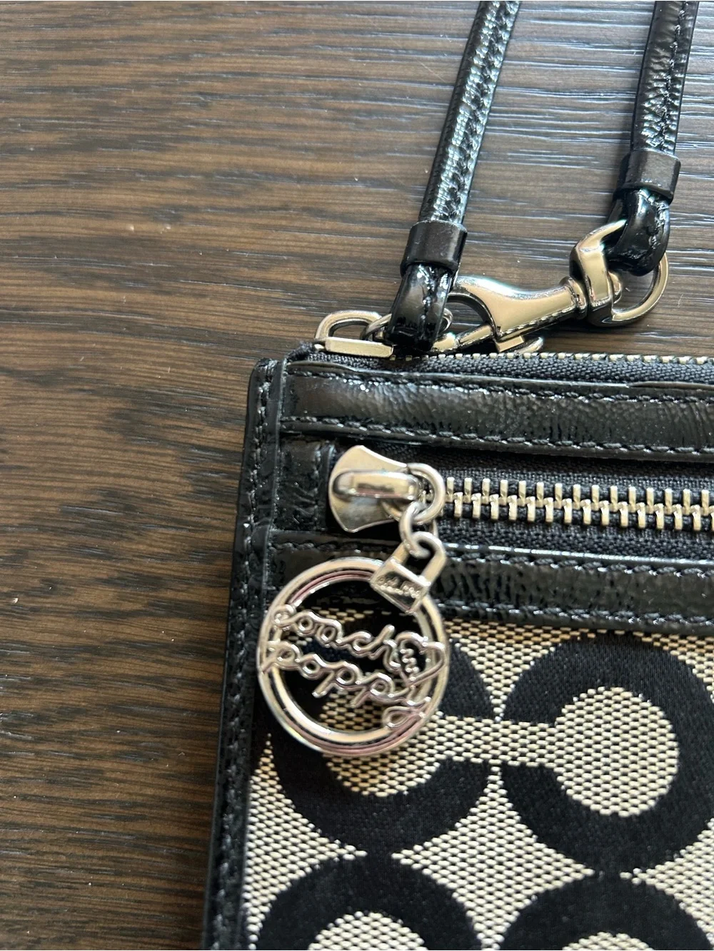 Coach Poppy Black and Cream Signature Wristlet